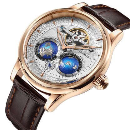 Luxury watch with brown leather strap and intricate face design on a white background