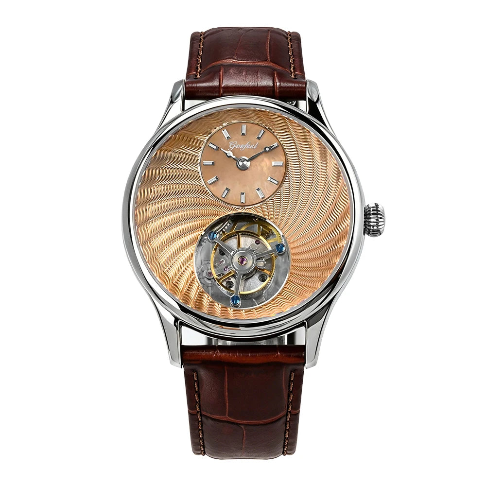 A luxury wristwatch featuring a round silver-tone case, a gold-toned dial with a visible tourbillon movement, and a dark brown leather strap, shown against a plain white background.