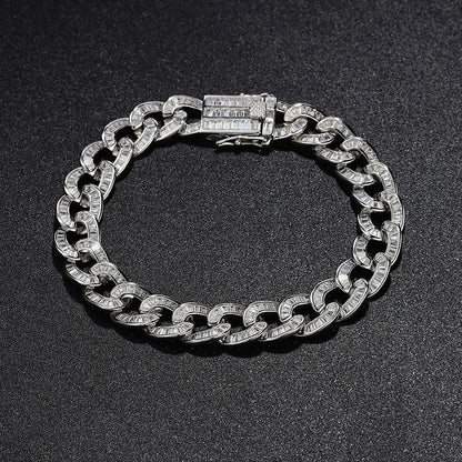 Silver chain bracelet on a black background