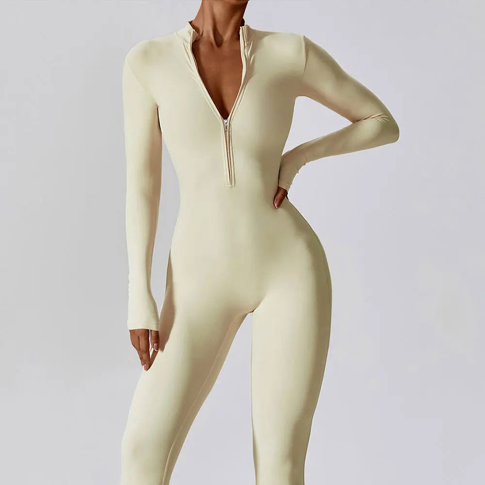 Beige bodysuit with a front zipper on a plain background