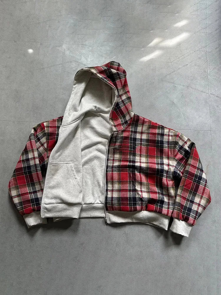 Plaid hoodie with white lining on a gray background