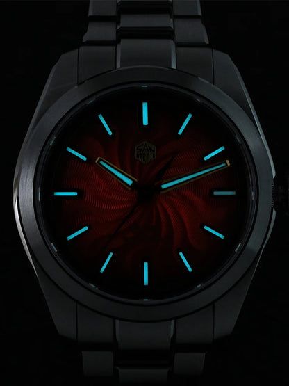 Black watch with glowing blue hands on a dark background