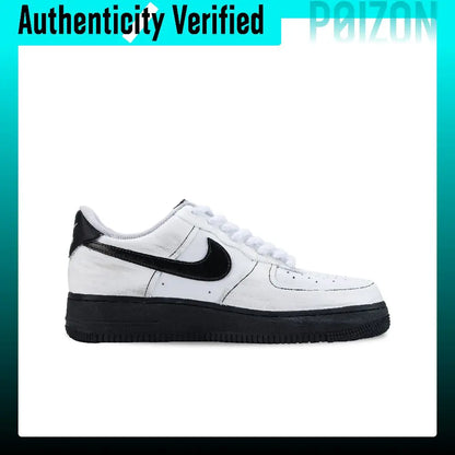 A white Nike Air Force 1 Low sneaker with a black Swoosh and black sole, shown in a side profile on a white background with a teal gradient border and 'Authenticity Verified' text at the top.