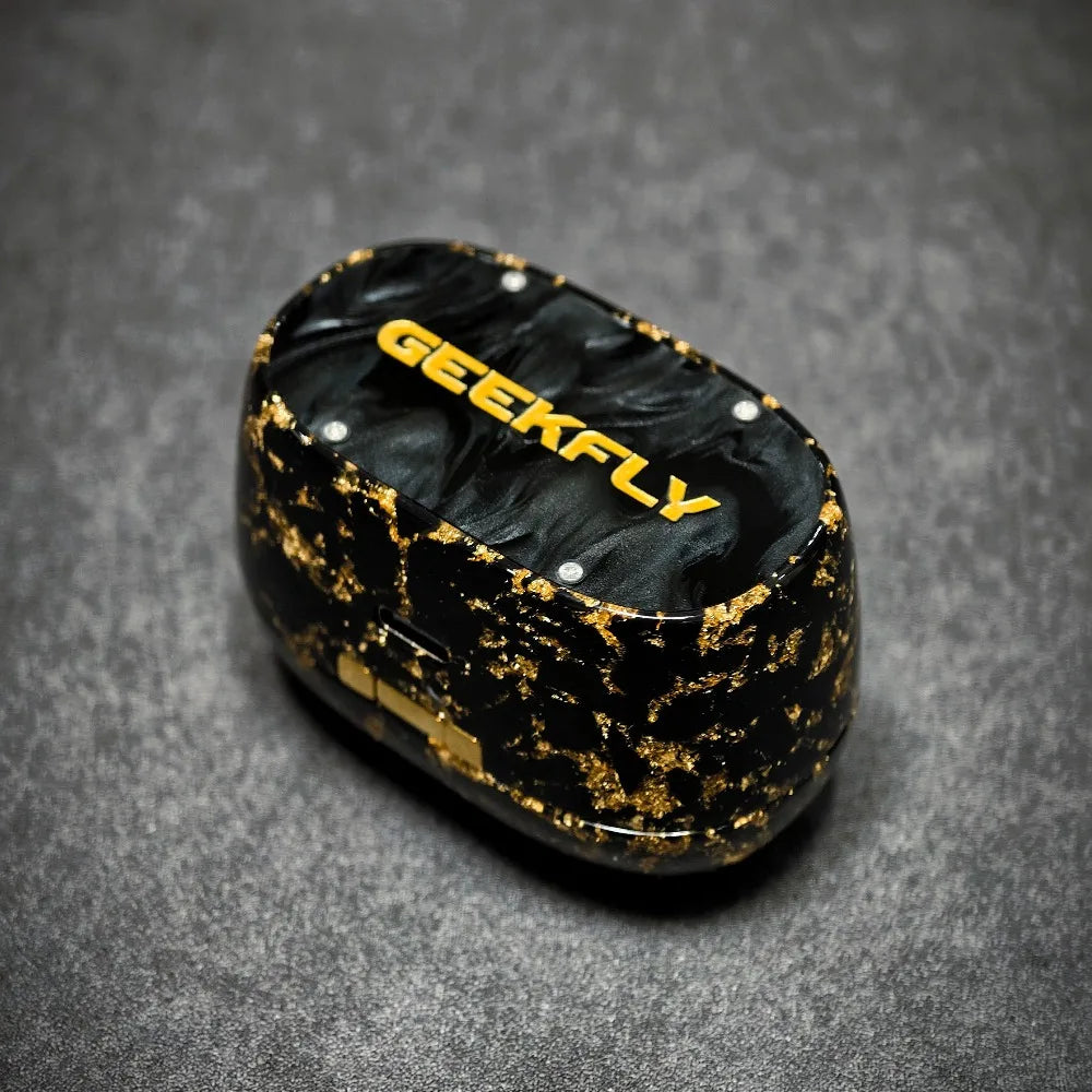 Black and gold case with 'GEEKFLY' branding on a gray background