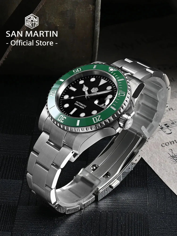 Watch with green bezel and silver case on a dark background, featuring San Martin branding.
