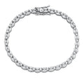 A silver tennis bracelet featuring a double row of marquise-cut and oval-cut clear stones, displayed on a solid white background.