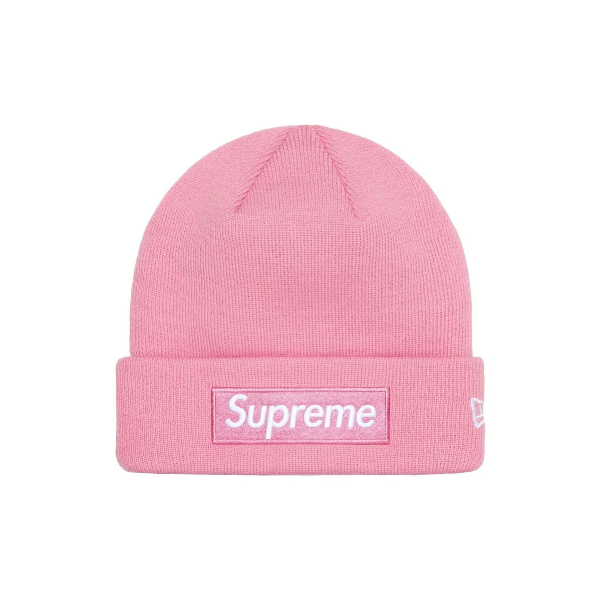 A pink ribbed knit beanie hat featuring a white Supreme box logo patch on the front cuff and a small white New Era flag logo on the side, set against a plain white background.