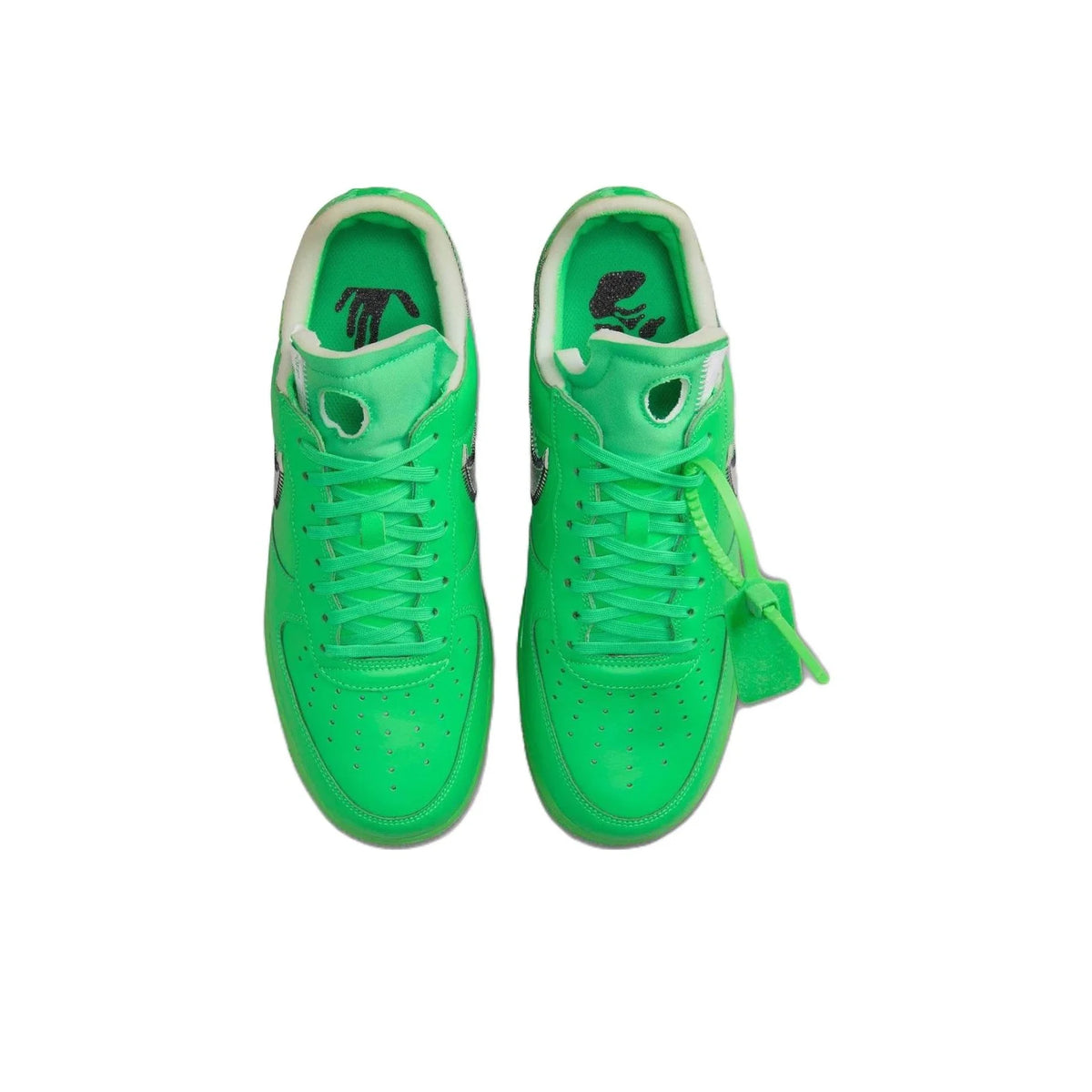 A pair of bright neon green low-top sneakers shown from a top-down view on a plain white background.
