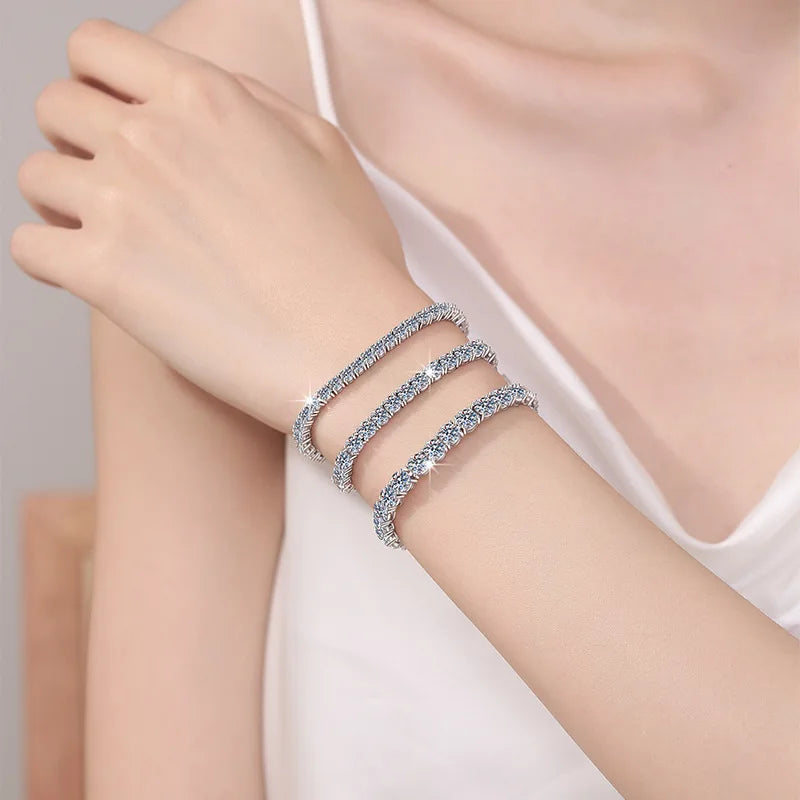 Silver bracelet on a person's wrist with a soft background