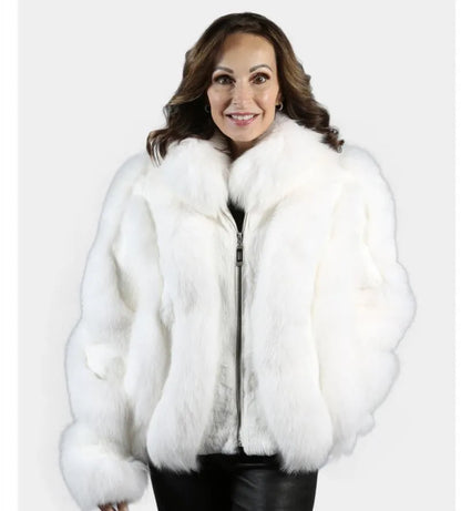 Woman wearing a white fur coat on a white background