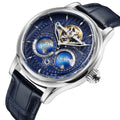 Luxury watch with blue face and black leather strap on a white background