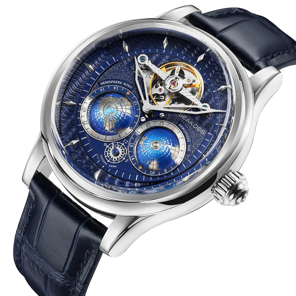 Luxury watch with blue face and black leather strap on a white background