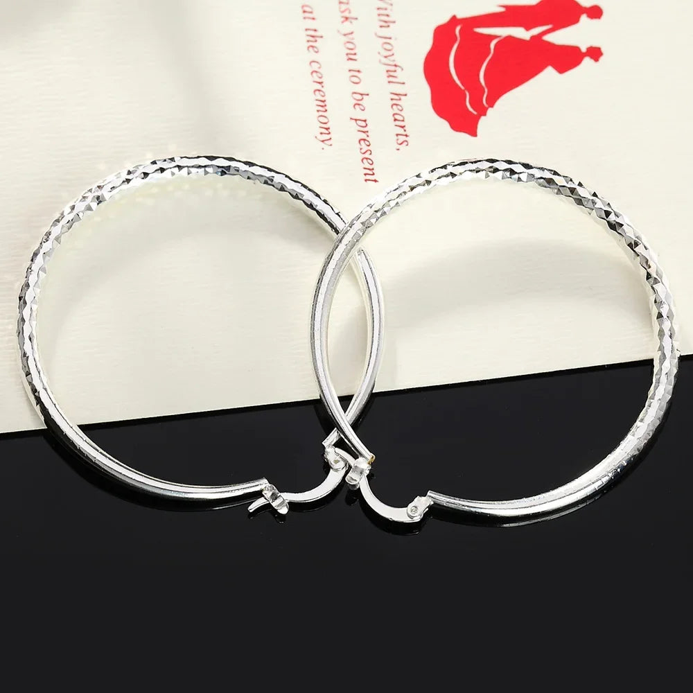 Vexaroa 5 cm hoop earrings - product gallery image 2
