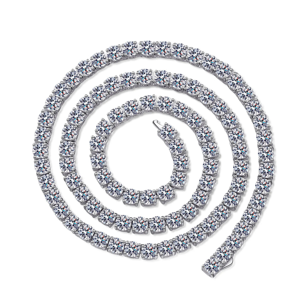 Silver necklace with clear gemstones on a white background