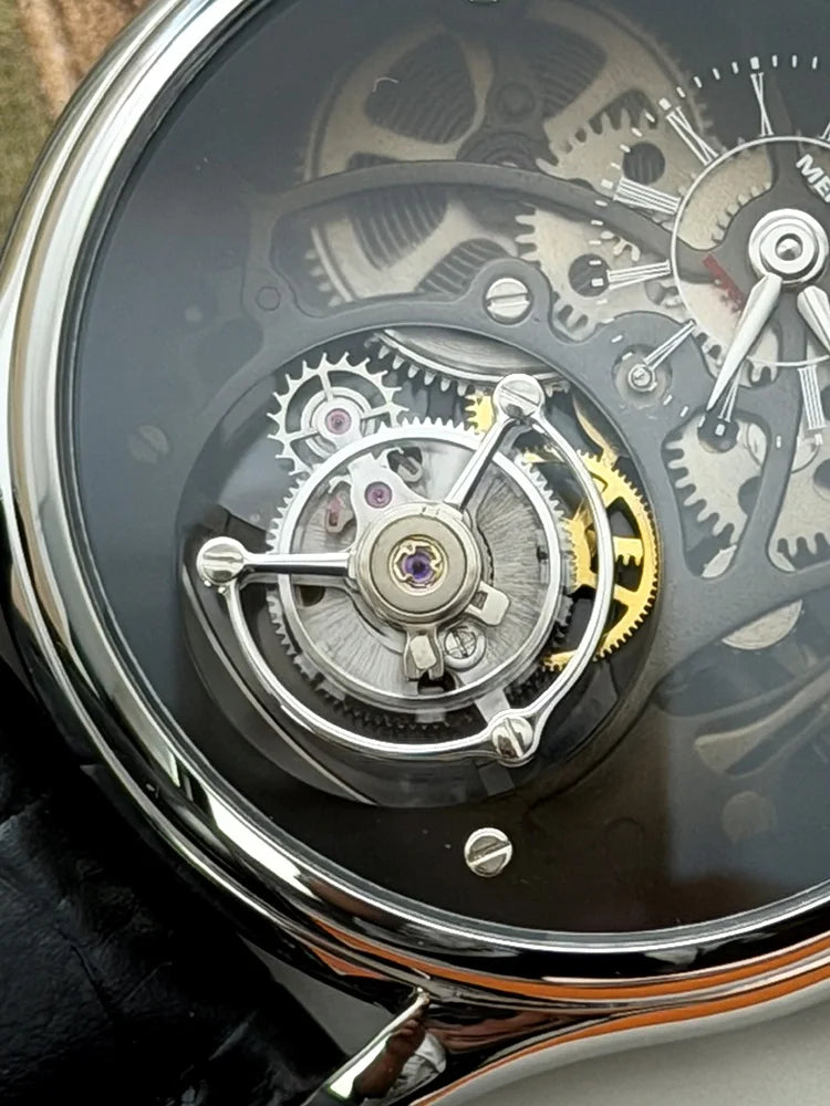 Close-up of a mechanical watch with visible gears and components.