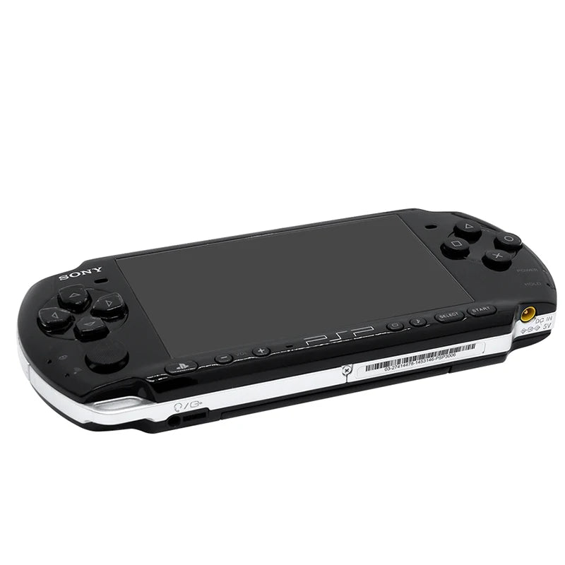 Black Sony gaming console on a white background
