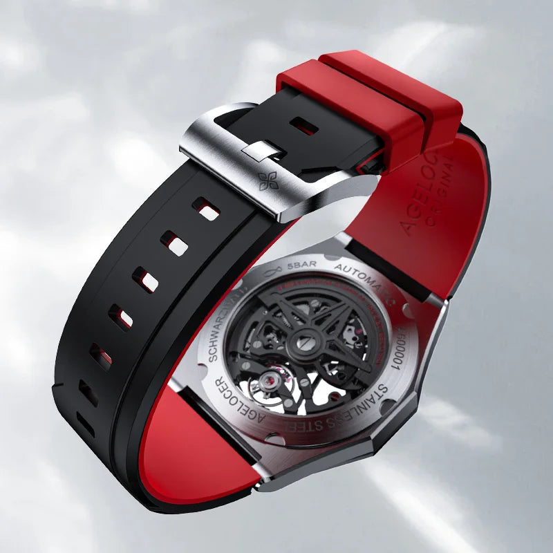 Watch with a red and black strap on a light gray background