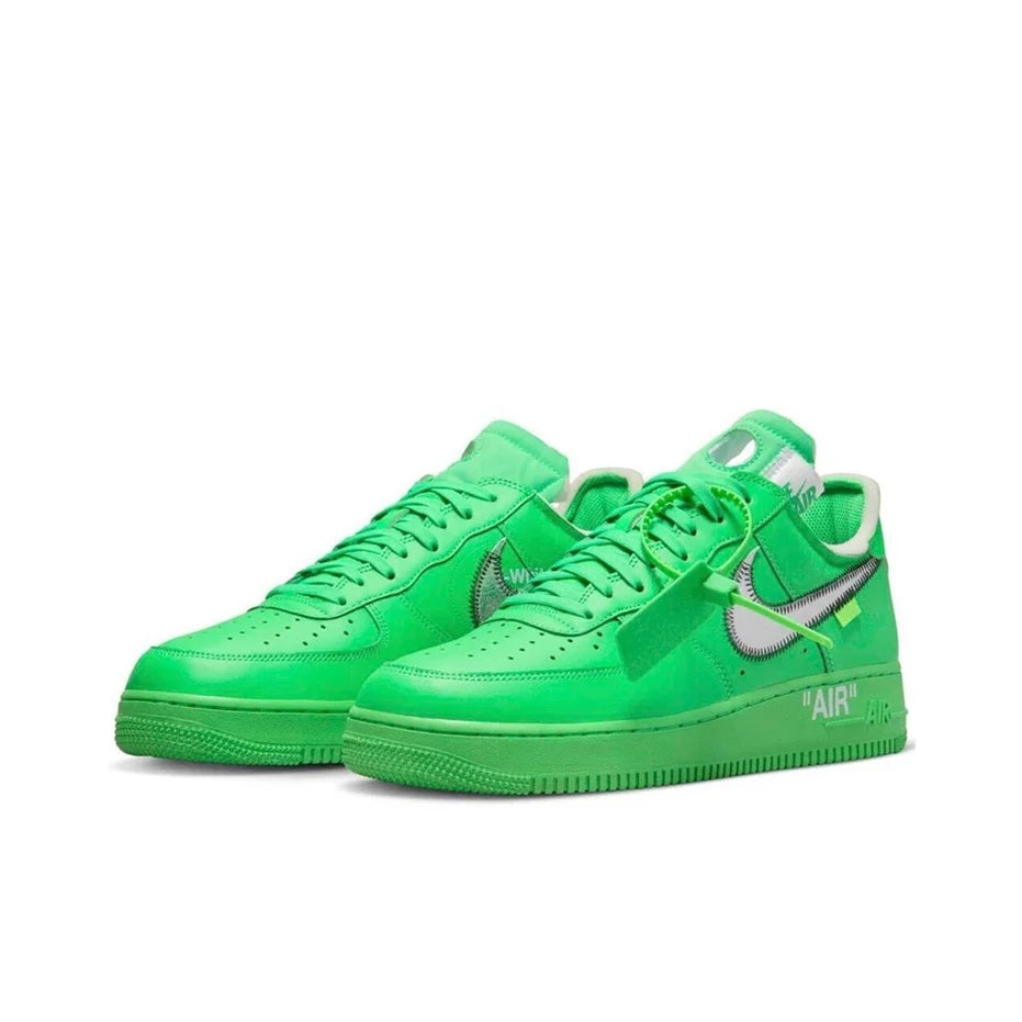 A pair of Nike Air Force 1 Low OG sneakers in a vibrant neon green colorway, featuring a metallic green Swoosh and 'AIR' text on the heel, set against a plain white background.