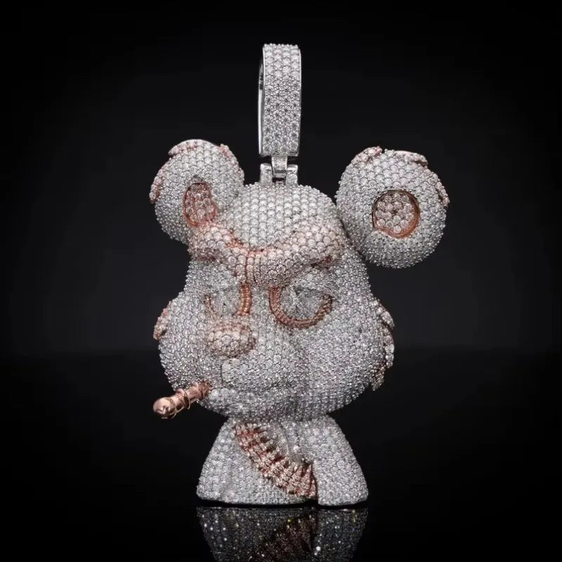 A highly detailed, diamond-encrusted character pendant or keychain charm, featuring a silver-toned body with rose gold accents, set against a solid black background.