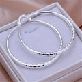Vexaroa 5 cm hoop earrings