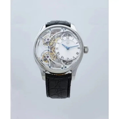 A luxury skeleton watch with a silver-toned case, a white dial with black Roman numerals, and a black textured leather strap, shown against a light gray background.