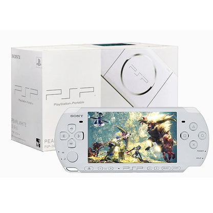 White Sony PlayStation Portable (PSP) gaming console with game display on a white background