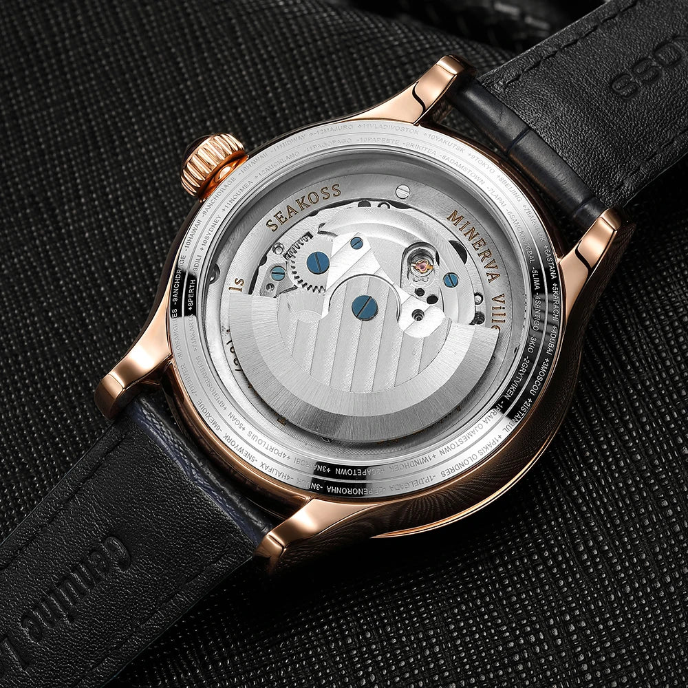Close-up of a watch with a visible brand name on a textured black background
