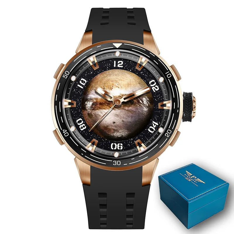 A wristwatch with a black silicone strap, a rose gold-toned case, and a unique dial featuring a realistic planet or moon image. A small blue presentation box is shown in the bottom right corner on a plain white background.