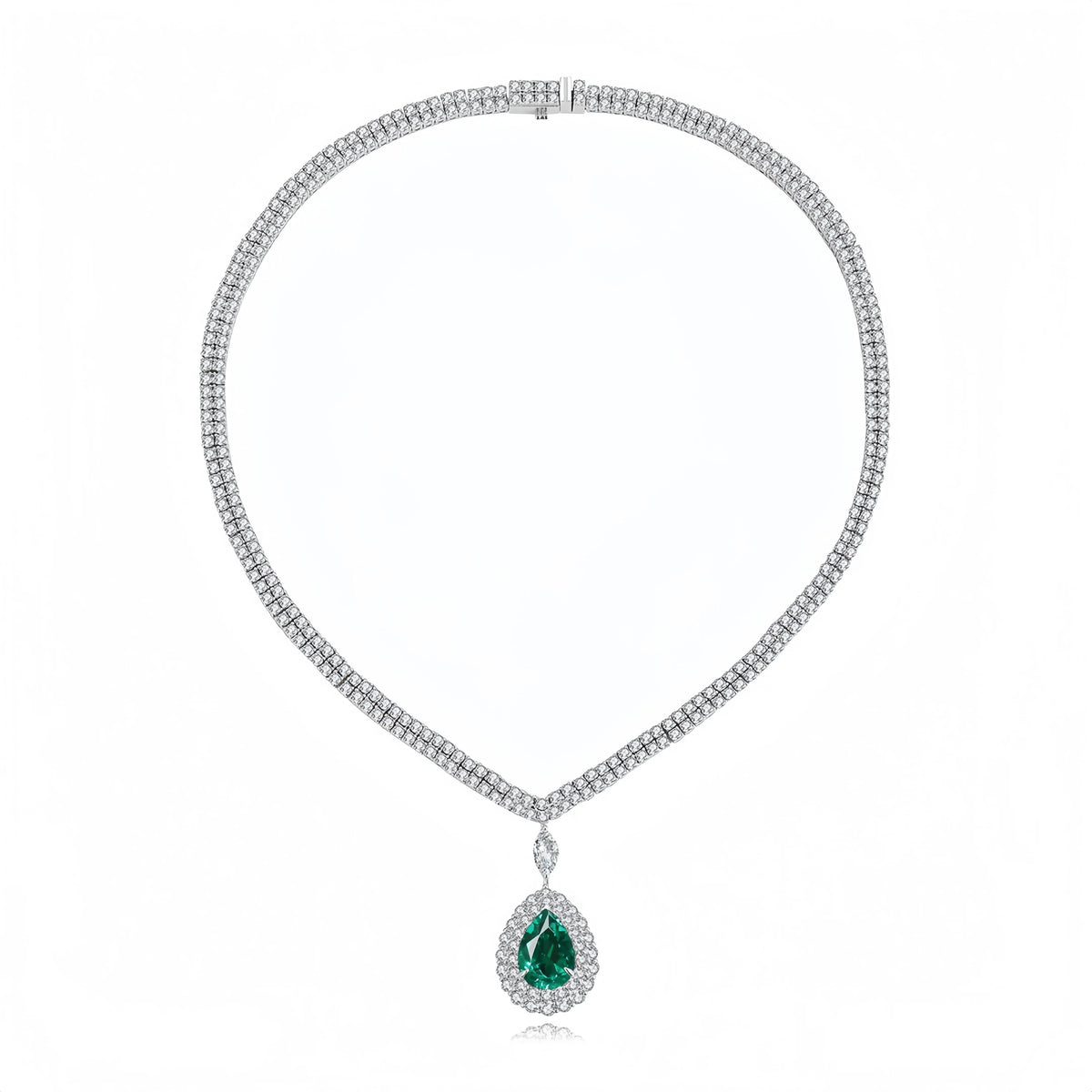 A white gold or platinum tennis necklace featuring a teardrop-shaped green emerald pendant surrounded by a halo of small clear stones, displayed on a clean white background.