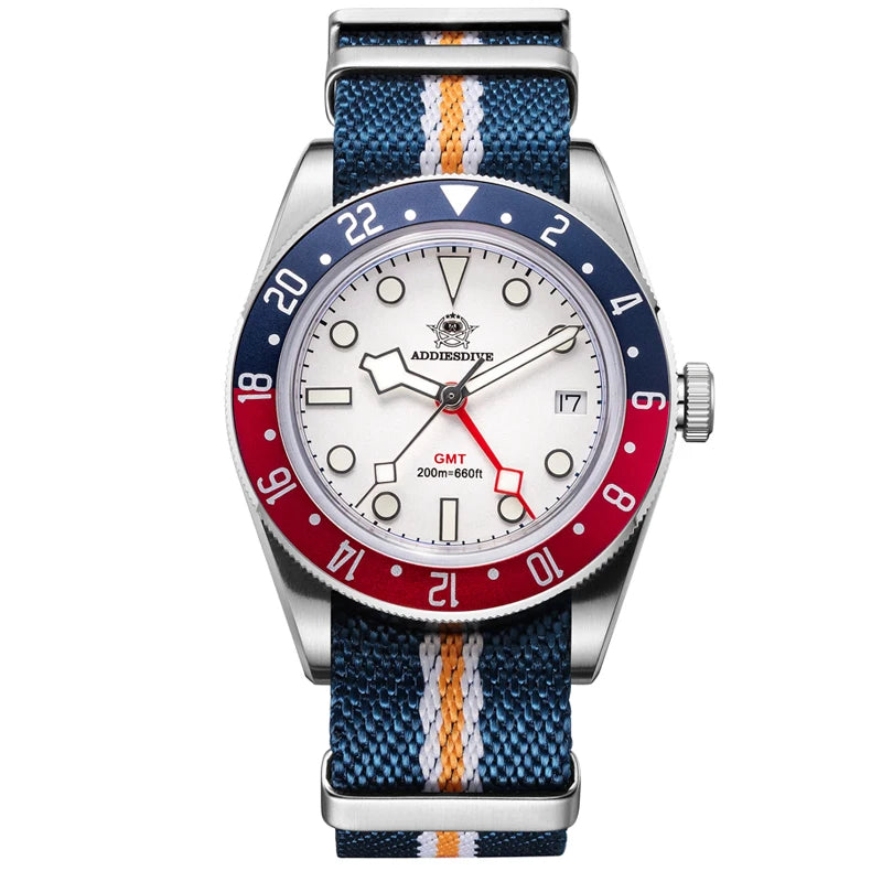 Watch with a blue and red bezel and multicolored strap on a white background