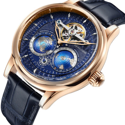 Luxury watch with blue face and black leather strap on a white background