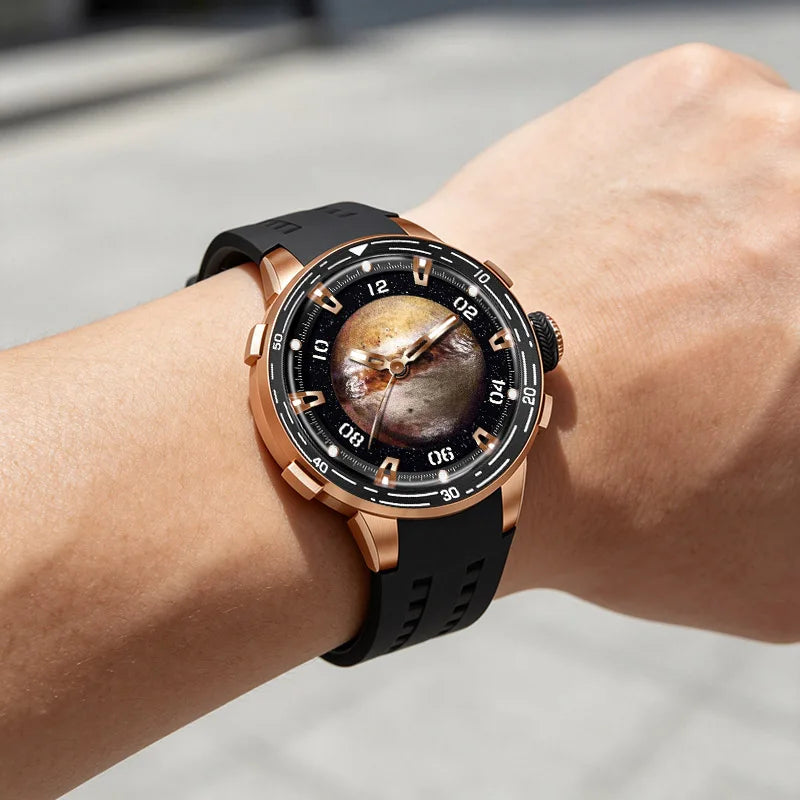 A close-up of a wrist wearing a round watch with a black rubber strap, rose gold case, and a detailed outer dial featuring a planet or moon design on a dark background.