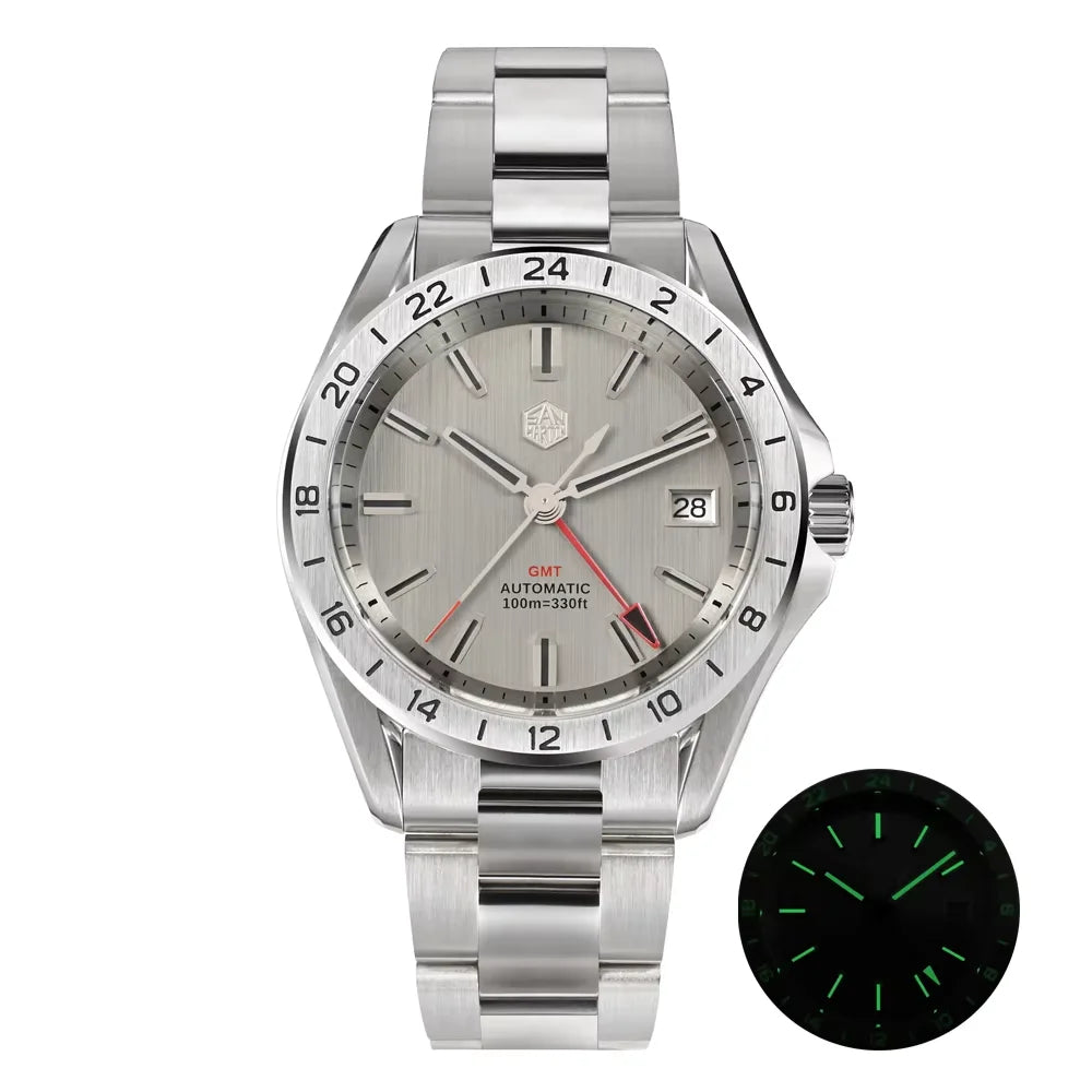 Silver watch with detailed face and additional green-lit face on a white background