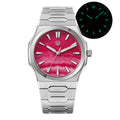 A stainless steel analog watch with a bright pink marbled dial and silver-tone metal link bracelet, shown on a white background with a small inset of the watch face in blacklight mode.