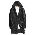 Black hooded coat with zippers on a white background