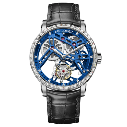Luxury watch with black leather strap and blue skeletonized face on white background
