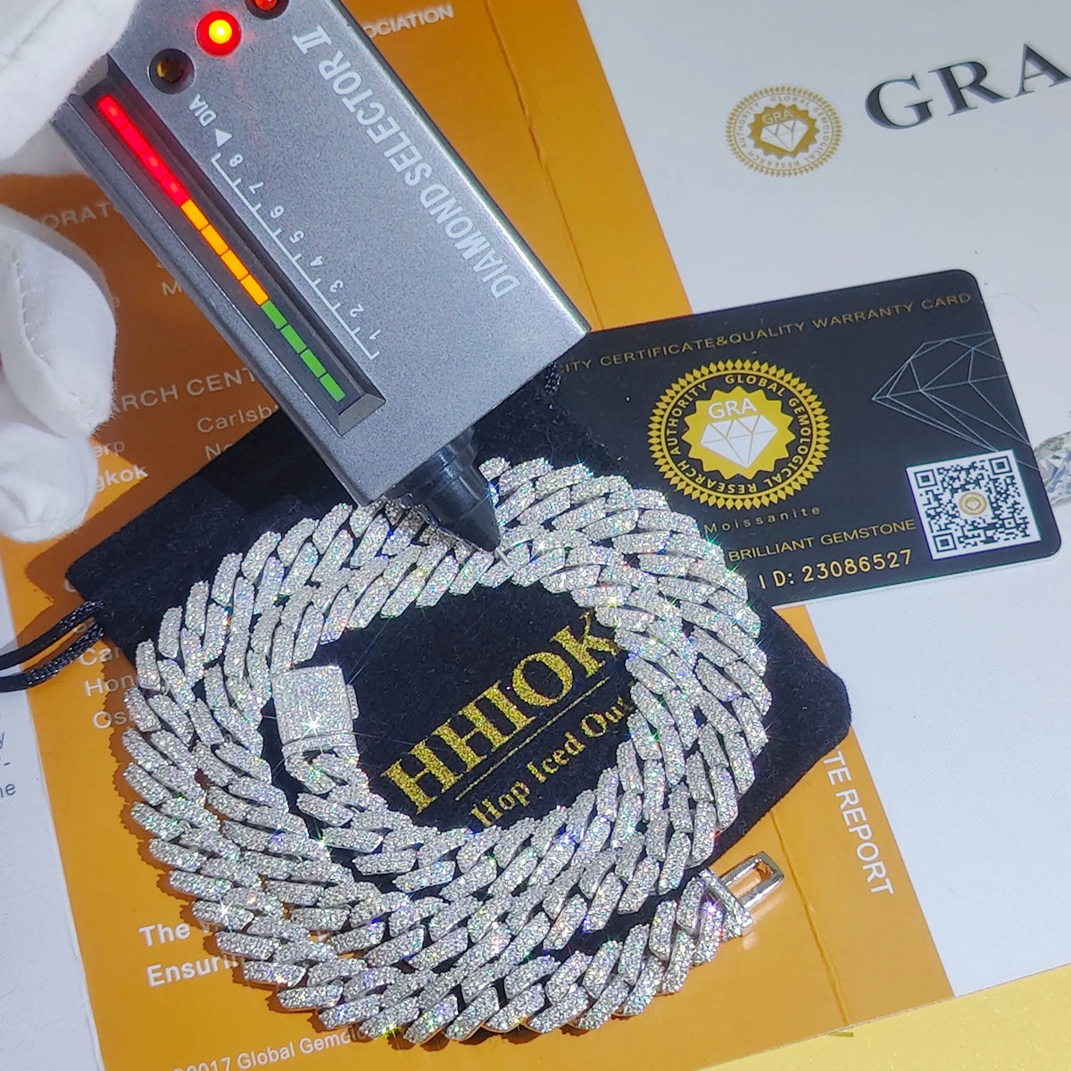 Diamond-encrusted necklace with 'HHIOK' branding on a white background